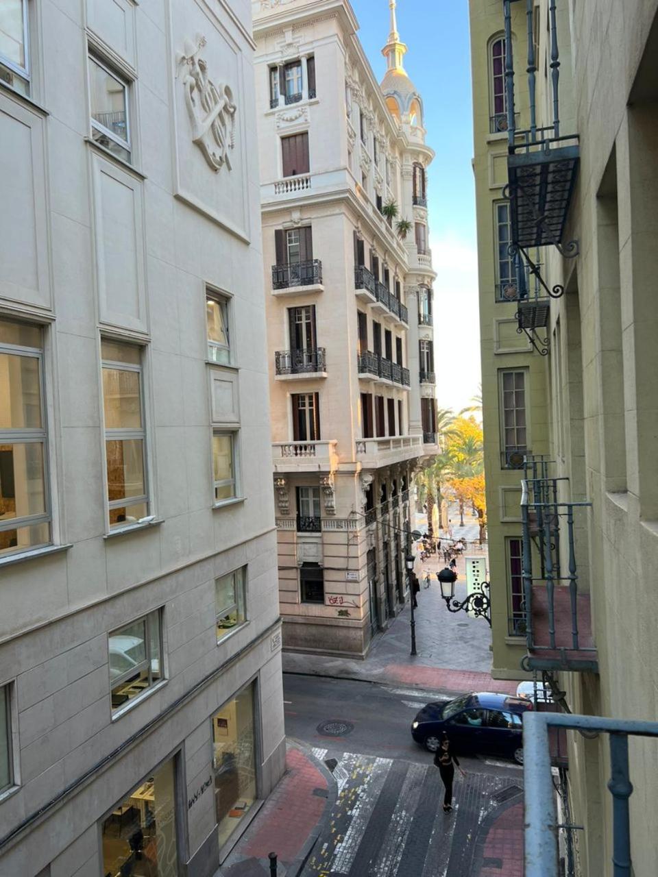 Hostal Milan Alicante Exterior photo The narrow streets of the quarter